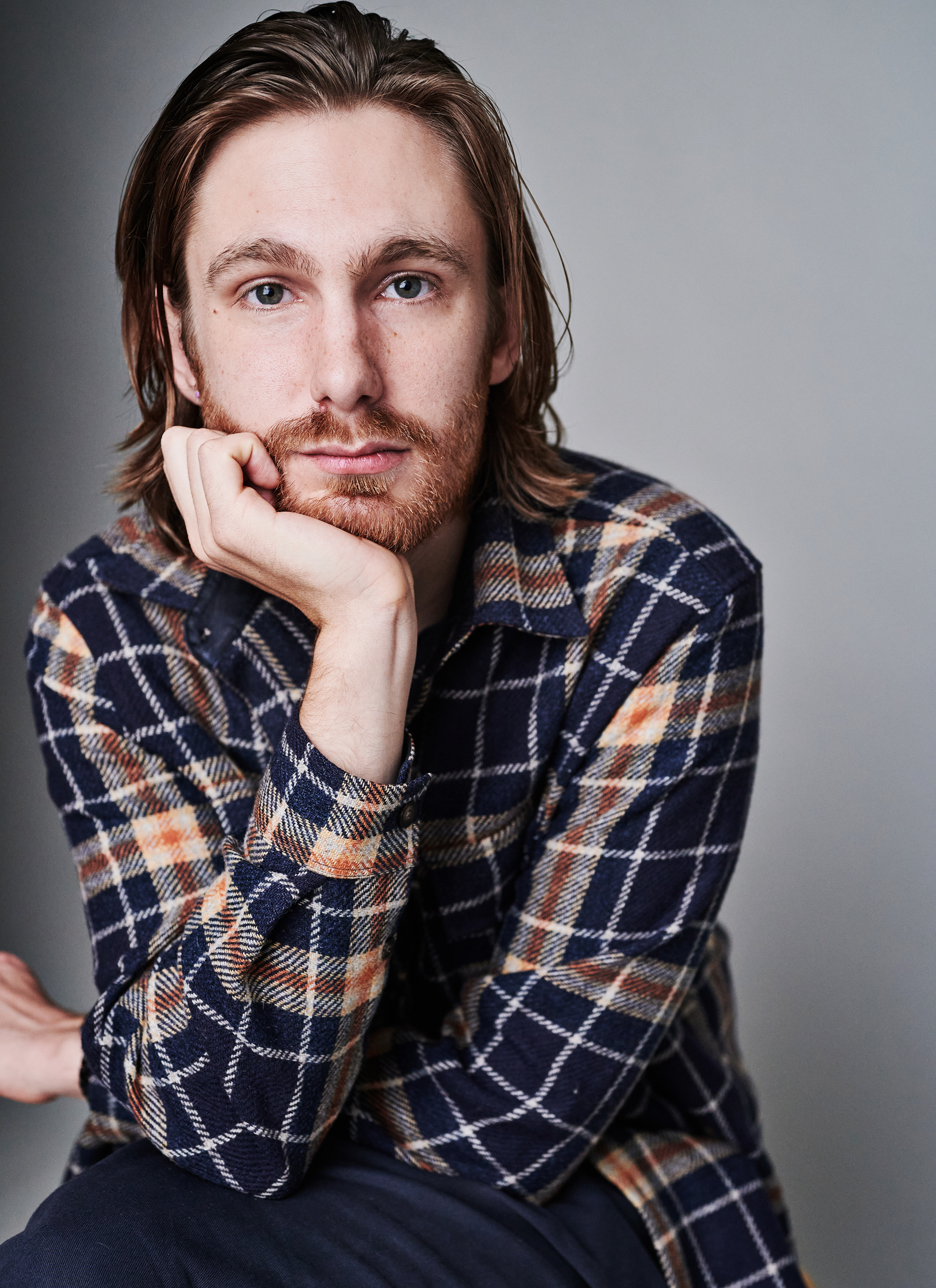 Portrait of Nick Howden-Steenstra, plaid shirt, by Ruth Crafer